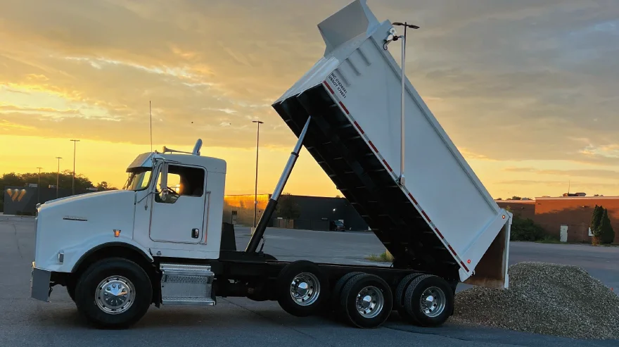 Custom Landscape Management's dump truck with logo on the side