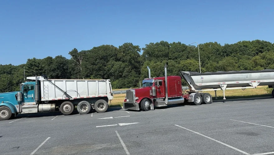 Custom Landscape Management's dump truck with logo on the side